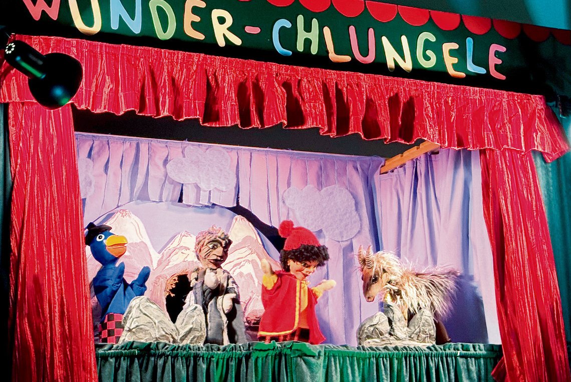 Kinder im Bann von Chasperli und Globi